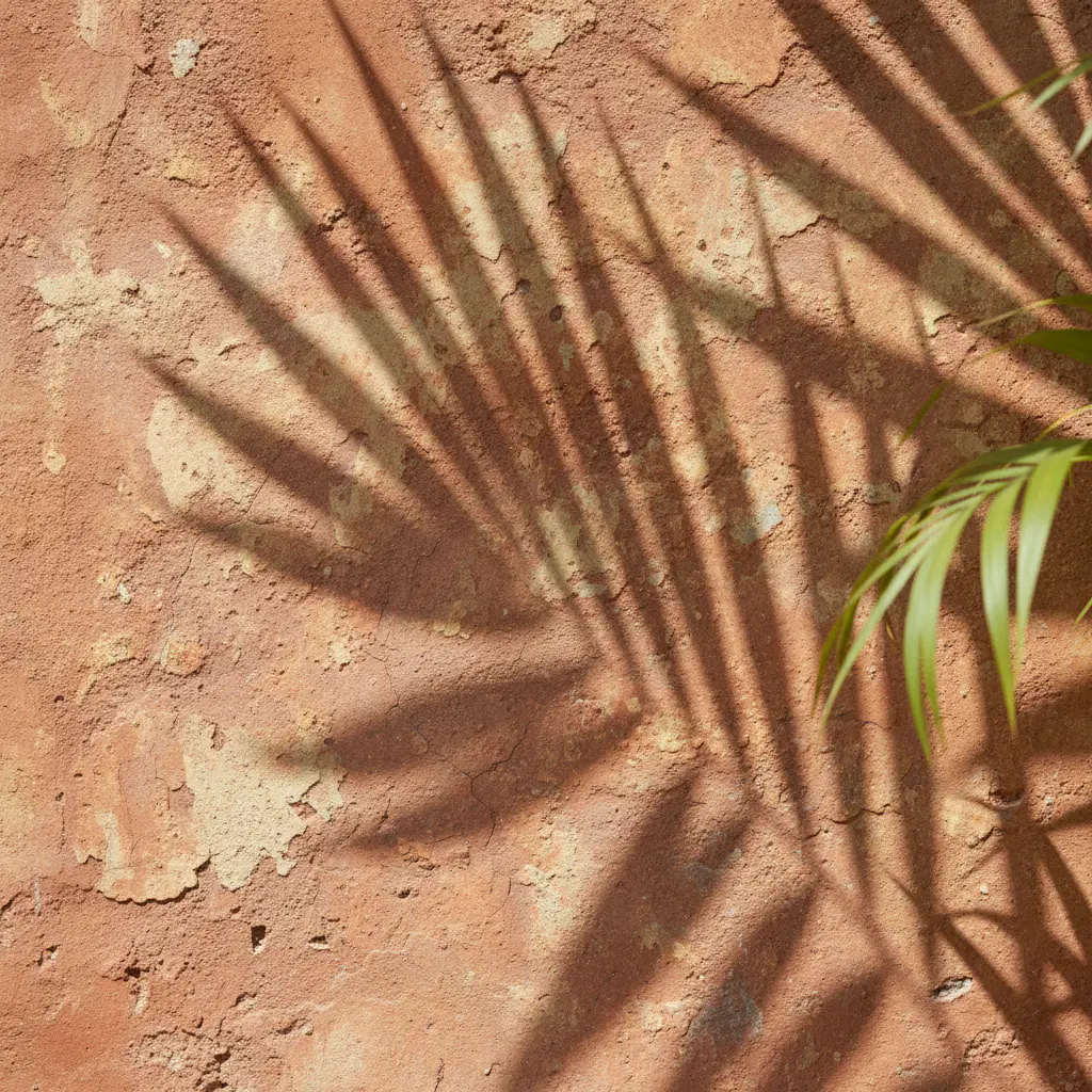 Abstract terracotta texture with organic leaf shadows